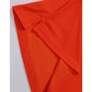 An orange polo shirt featuring a folded sleeve detail and a branding logo.