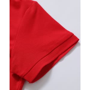 A red polo shirt featuring a textured fabric and a folded sleeve detail. It has a logo on the garment.
