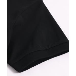 A black ultrafine cotton pique polo shirt with a smooth finish and a logo on the sleeve.