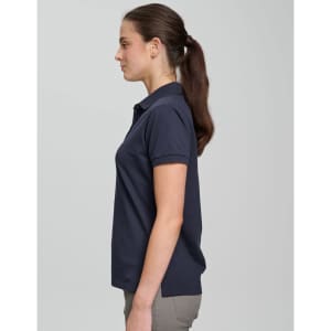 A navy ultrafine cotton pique polo is displayed, featuring a collar and short sleeves, worn by a model.