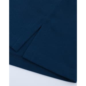 A close-up of a navy ultrafine cotton pique polo, featuring textured fabric and clean hems.