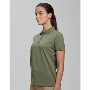 A woman wearing an olive green ultrafine cotton pique polo with a classic collar and short sleeves.