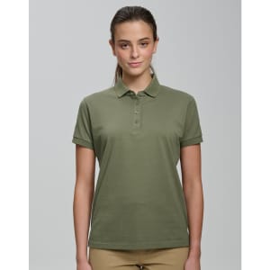 A green ladies' ultrafine cotton pique polo with a collar and three buttons. It features branding.
