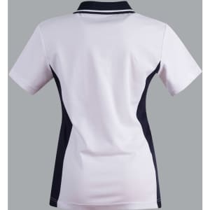 A ladies' polo shirt in white with navy contrast accents, featuring a collar and short sleeves. It has a logo detail.