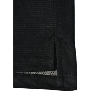 A black polo shirt featuring a textured fabric and side slit detail, also has a logo on it.