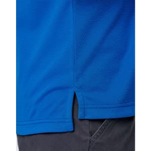 A close-up of a blue polo shirt with a side vent detail, featuring a logo at the chest area.