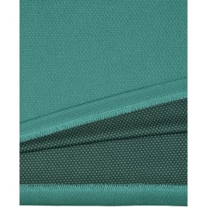 A close-up view of a teal bamboo charcoal polo shirt, showcasing its textured fabric. The shirt features a logo.