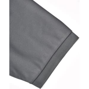 A grey polo shirt featuring a short sleeve with a neatly finished cuff and a logo.