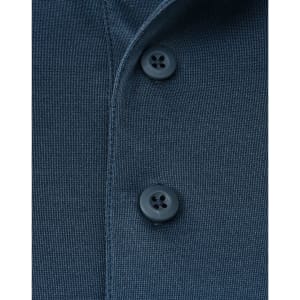 Close-up of a navy blue poly/cotton polo shirt featuring two buttons and a textured fabric. Includes a logo.