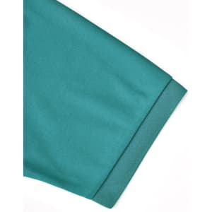 A close-up of a teal men's sustainable poly/cotton polo shirt sleeve with a branded label.