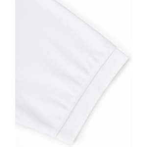A close-up of a white men's polo shirt, featuring short sleeves and a ribbed cuff. The shirt includes a logo.
