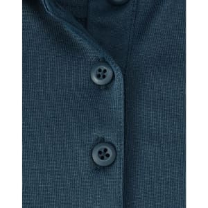 A close-up of a dark teal polo shirt featuring three buttons and a textured fabric. The shirt has a logo.