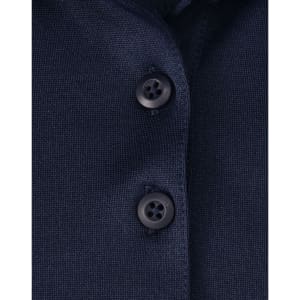 Close-up of a navy blue polo shirt featuring a button placket and a logo.
