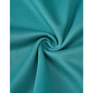 A close-up of teal fabric, showcasing a smooth, textured surface ideal for polo shirts. The image features a logo.