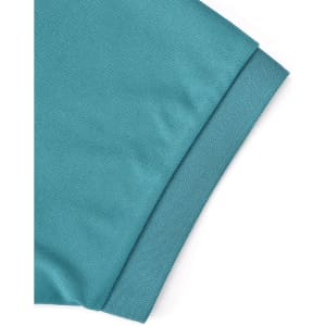 A close-up of a teal polo shirt, highlighting the folded sleeve. The fabric has a smooth texture and includes a logo.