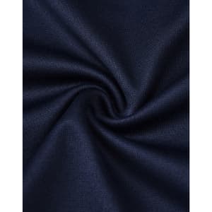A close-up view of dark navy fabric with a smooth texture, showcasing its soft and sustainable qualities.