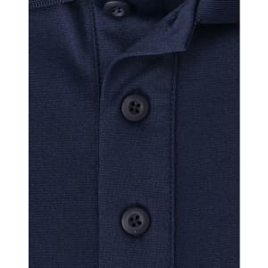 A navy blue polo shirt featuring a button placket and a logo. The fabric is a sustainable poly/cotton blend.