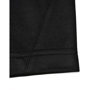 A close-up of a black polo shirt with a contrast sleeve hem and stitching detail. Features a logo on the side.