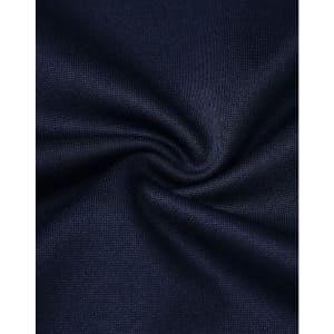 A close-up of textured navy fabric, showcasing the sustainable poly/cotton blend used in kids' polo shirts.