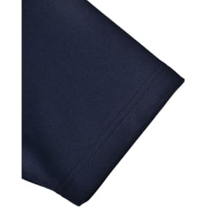 A close-up of the sleeve hem of a kids' polo shirt in navy blue, featuring a smooth fabric texture and a logo.