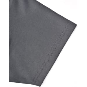 A close-up of the sleeve of a grey polo shirt, featuring a stitching detail and a logo on the fabric.