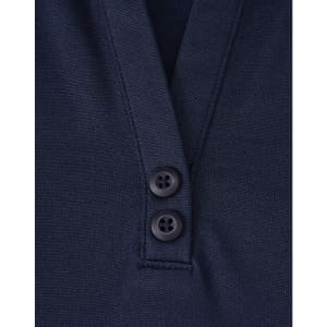 A navy polo shirt featuring a collared neckline and two buttons. It has a logo on it.