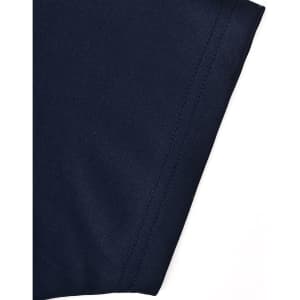 A close-up of a navy polo shirt featuring contrasting fabric texture and stitching details.