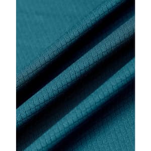 A close-up of a textured, sustainable jacquard knit fabric in a rich teal colour.