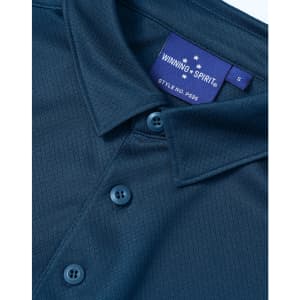 A navy blue men's sustainable jacquard knit short sleeve polo with a branded label and button details.