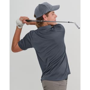 A model swings a golf club while wearing a grey sustainable jacquard knit short-sleeve polo shirt and a cap.