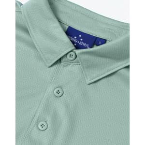A light green sustainable jacquard knit short-sleeve polo shirt featuring a collar and buttons, with a logo.