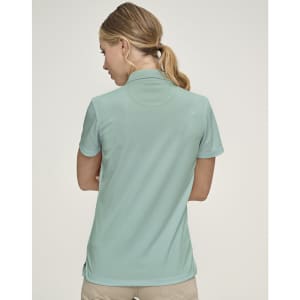 A green ladies' polo shirt with a jacquard knit design, featuring a collar and short sleeves.
