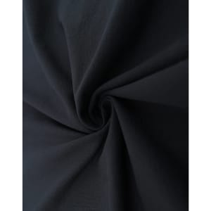 A close-up of black fabric showcasing its smooth texture and flexibility. The material appears lightweight and breathable.