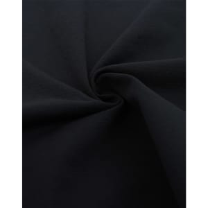 A close-up of black fabric in a swirling pattern, showcasing a soft texture ideal for apparel.