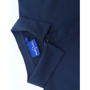 A navy blue high-performance polo shirt featuring a collar and a brand label.