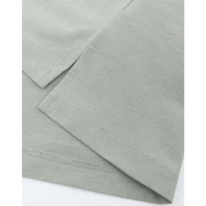 A close-up of a grey high-performance polo shirt, highlighting the fabric texture and neatly stitched hems.