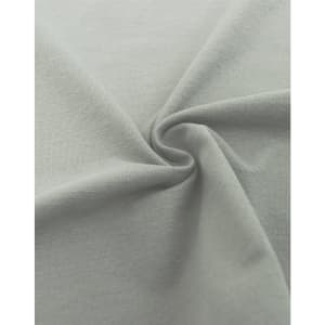 A close-up of a soft, grey fabric in a spiral formation, showcasing its smooth texture.