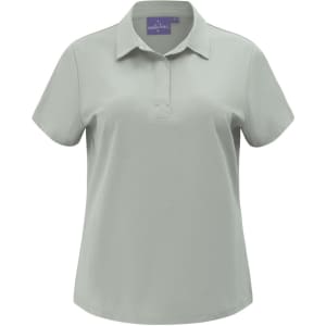 A ladies' high-performance polo in light grey with a collar and short sleeves. It features a logo on the neck.