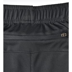 Bamboo charcoal sports shorts in black with a textured fabric and an elastic waistband featuring a zippered pocket.