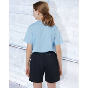 Black sports shorts made from bamboo charcoal, worn by a child in a light blue shirt, facing away from the camera.