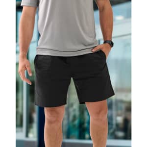 Unisex mercerised cotton shorts in black, featuring side pockets and a comfortable fit, paired with a grey top.