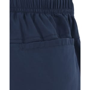 Unisex mercerised cotton shorts in navy, featuring an elastic waistband and a pocket design.