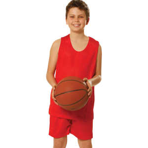 A boy wearing a red basketball vest and matching red shorts holds a basketball. The outfit features a logo.