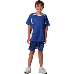 Blue kid's soccer shorts paired with a matching blue and white top, worn by a smiling child.