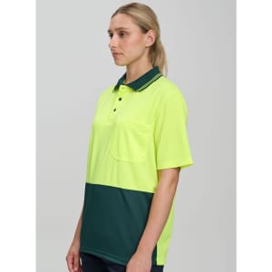 A high-visibility short-sleeve safety polo in bright yellow and dark green, featuring a pocket and a logo.
