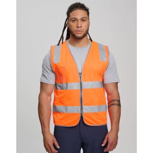 An orange safety vest featuring reflective strips and utility pockets, worn by a person with long hair.