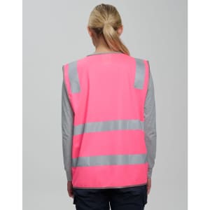 A pink high-visibility safety vest featuring reflective stripes and a back view. It includes ID and utility pockets.