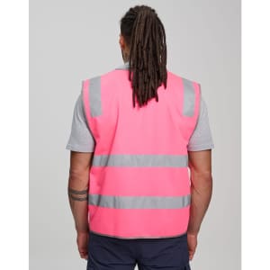 A pink high-visibility safety vest with reflective stripes, featuring ID and utility pockets. No visible branding.