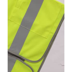 A bright yellow high-visibility safety vest featuring grey reflective stripes and utility pockets.