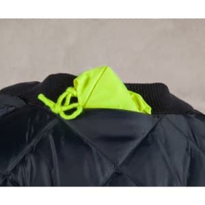 A hi-vis two-tone flying jacket in black and bright yellow, featuring a quilted design and a hood tucked into the collar.